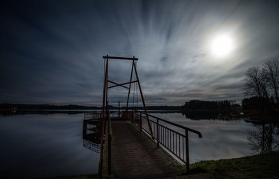 Bridge over lake against sky