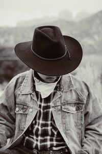 Rear view of man wearing hat