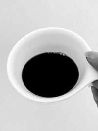 Directly above shot of coffee cup on table