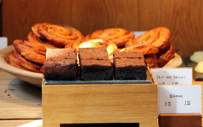 High angle view of fresh baked pastries on display at store