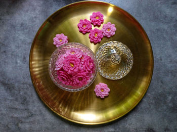 High angle view of purple flowers in bowl on table