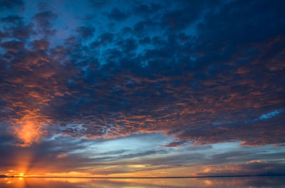 Low angle view of dramatic sky during sunset