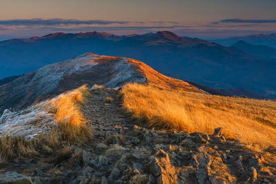 Scenic view of mountain against sky during sunset