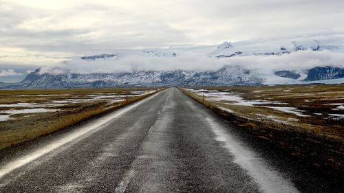 Road against sky during winter