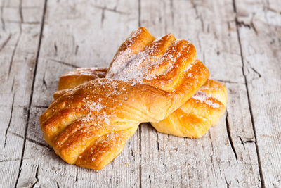 Close-up of bread on wooden table