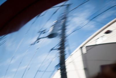 Low angle view of ferris wheel against sky