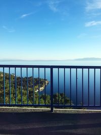 Scenic view of sea against blue sky