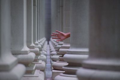 View of white pillars in rows