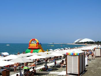 View of sea against clear blue sky