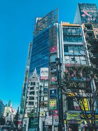 Low angle view of modern building against clear sky