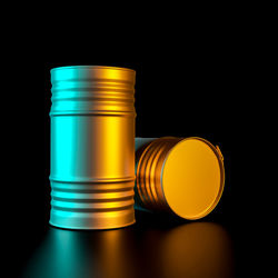 Close-up of coins on table against black background