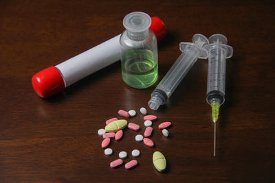 High angle view of bottles on table