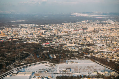 High angle view of road amidst buildings in city