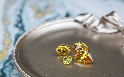 High angle view of wedding rings on table