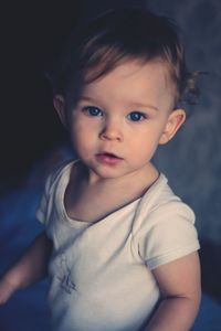 Portrait of cute baby girl at home