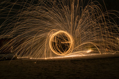 Firework display at night