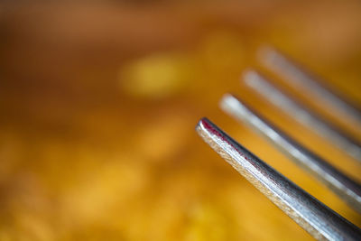Close-up of fork on table
