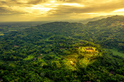 Scenic view of landscape against sky during sunset