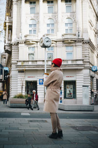 Rear view of man walking on street