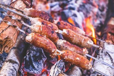 Close-up of meat on barbecue