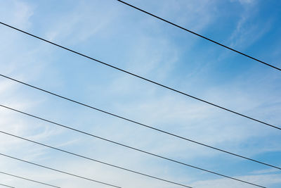 Low angle view of electricity pylon