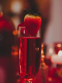 Close-up of red wine in glass on table