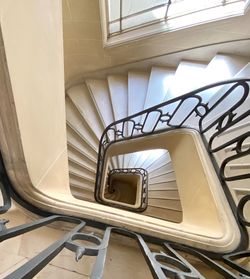 Directly below shot of spiral staircase in building