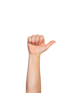 Close-up of human hand against white background