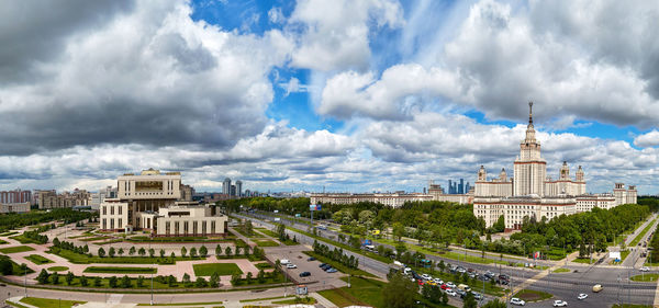 Modern fundamental library building in the autumn campus of moscow university under dramatic sky