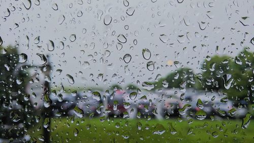 Full frame shot of wet window in rainy season