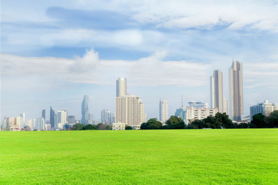 View of buildings against cloudy sky