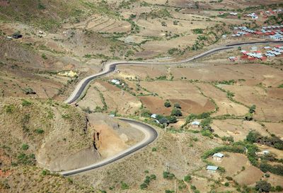 High angle view of road passing through land