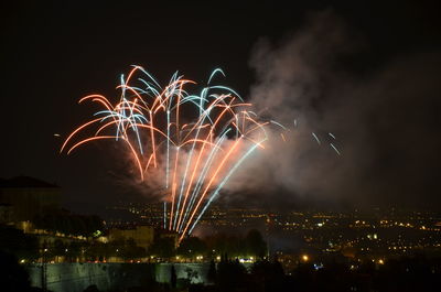 Firework display at night