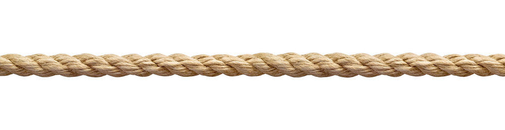 Close-up of rope against white background