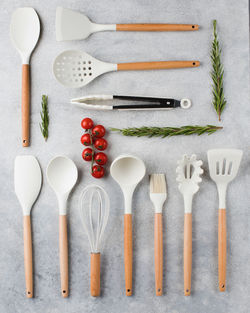 Set of kitchen utensils on a gray background. the concept of the kitchen, the preparation of dishes.