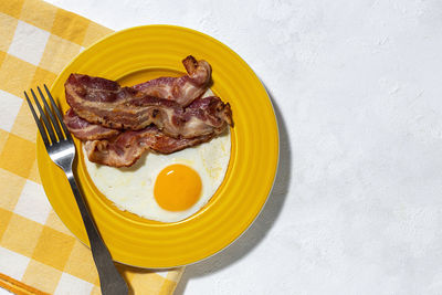 High angle view of breakfast in plate on table