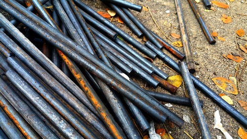 Full frame shot of rusty metal chain on field