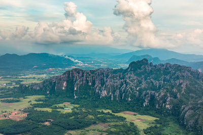 Panoramic view of landscape against cloudy sky