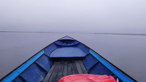 Boat in sea against sky