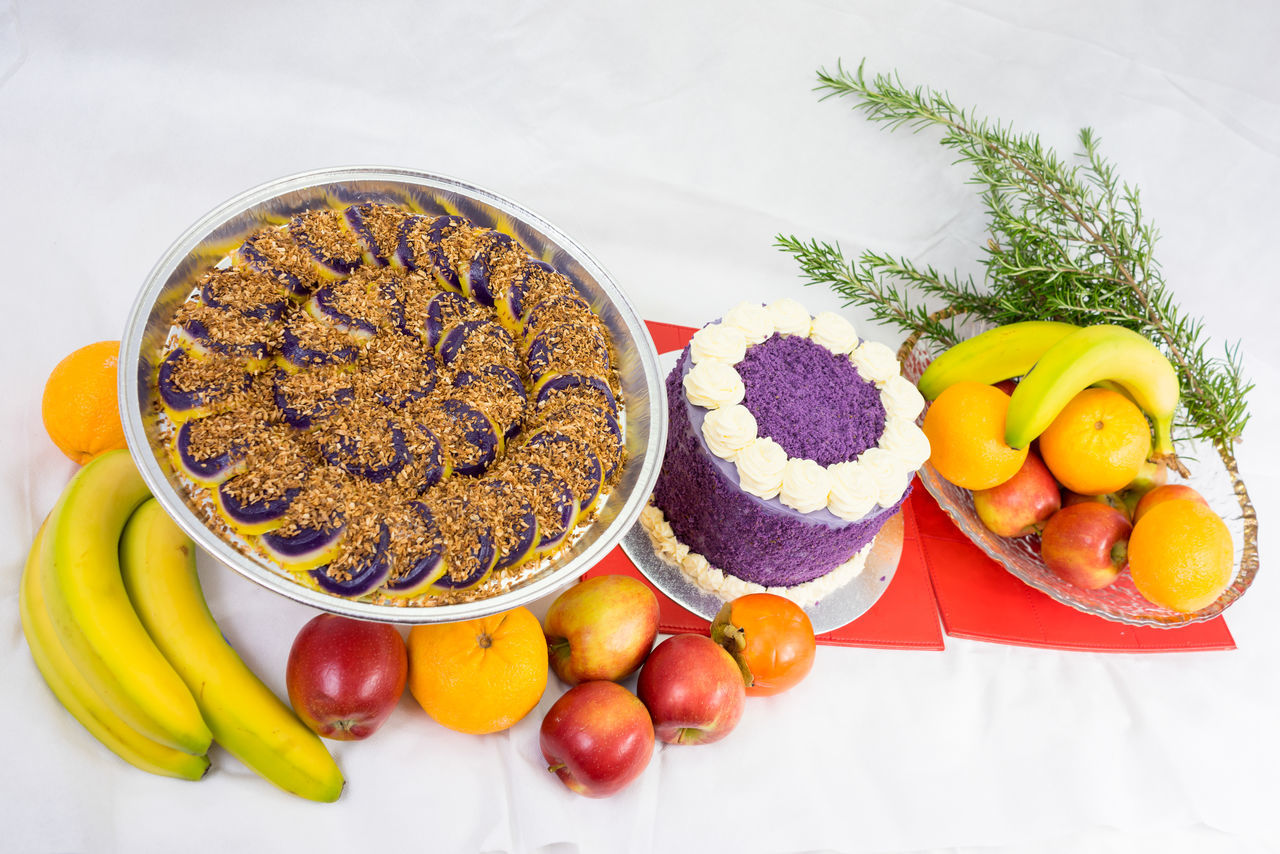 HIGH ANGLE VIEW OF MULTI COLORED FRUITS ON PLATE