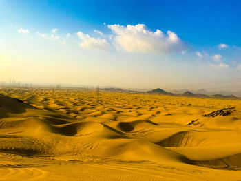 Scenic view of desert against sky