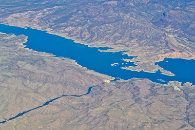 High angle view of lake by mountain