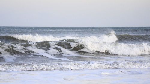 Scenic view of sea against clear sky