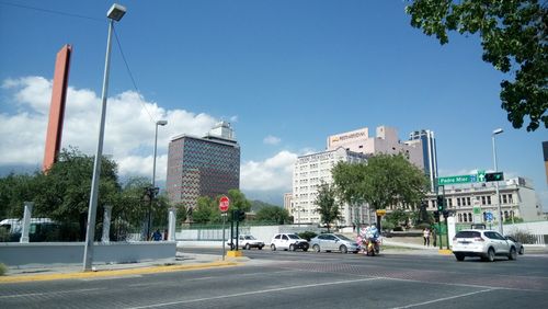 View of city street against sky