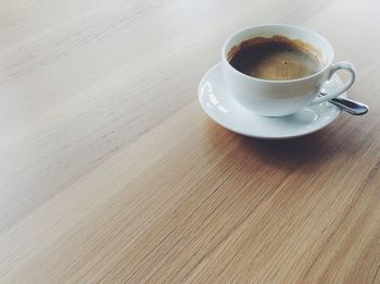 Close-up of coffee cup on table