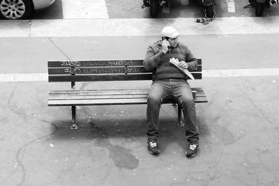 Man sitting on mobile phone