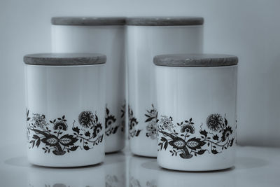 Close-up of glass jar on table