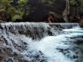 Man surfing in water