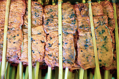 Full frame shot of meat on barbecue grill