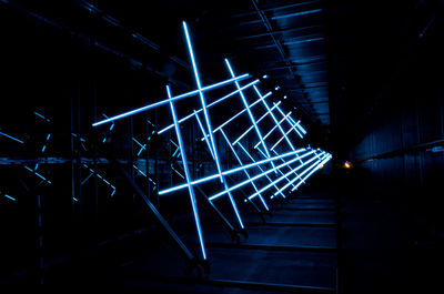 Low angle view of illuminated staircase at night